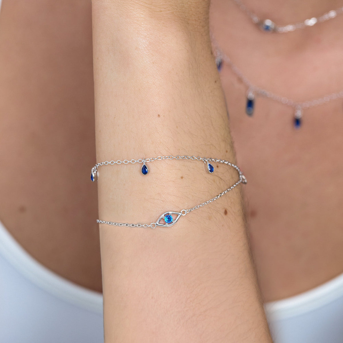 Blue CZ Pear Cut Bezel Station Bracelet