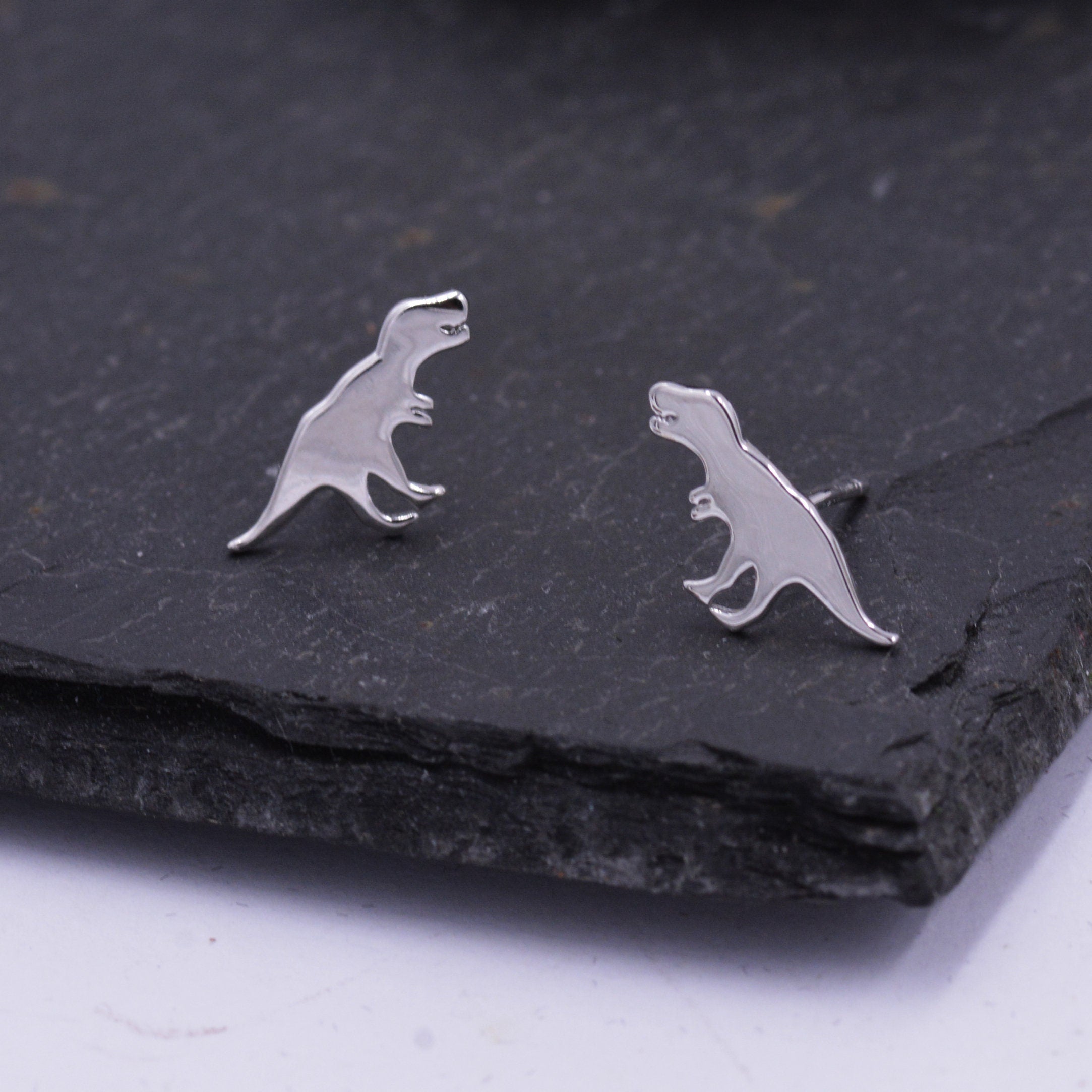 T rex stud earrings store