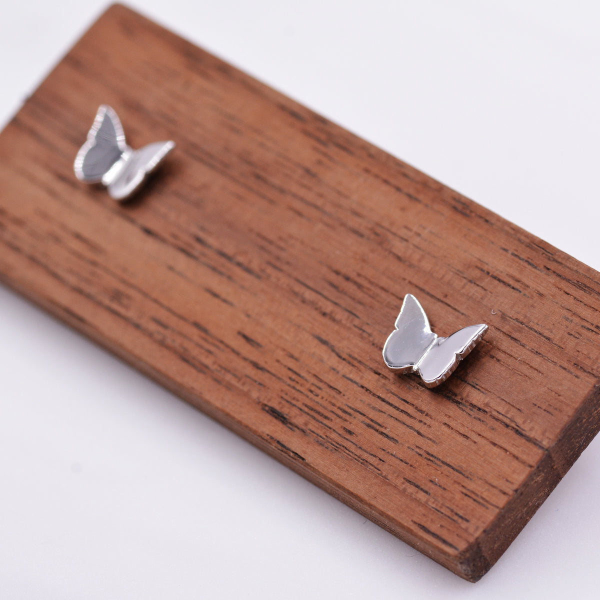 Tiny Butterfly Stud Earrings in Sterling Silver, Cute Dainty Minimal Jewellery