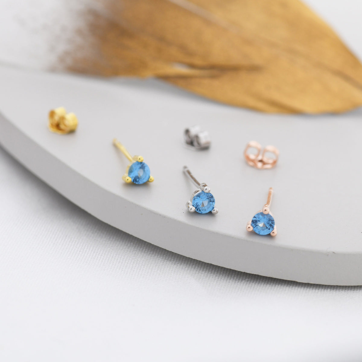 Aquamarine Blue CZ Three-Prong Stud Earrings