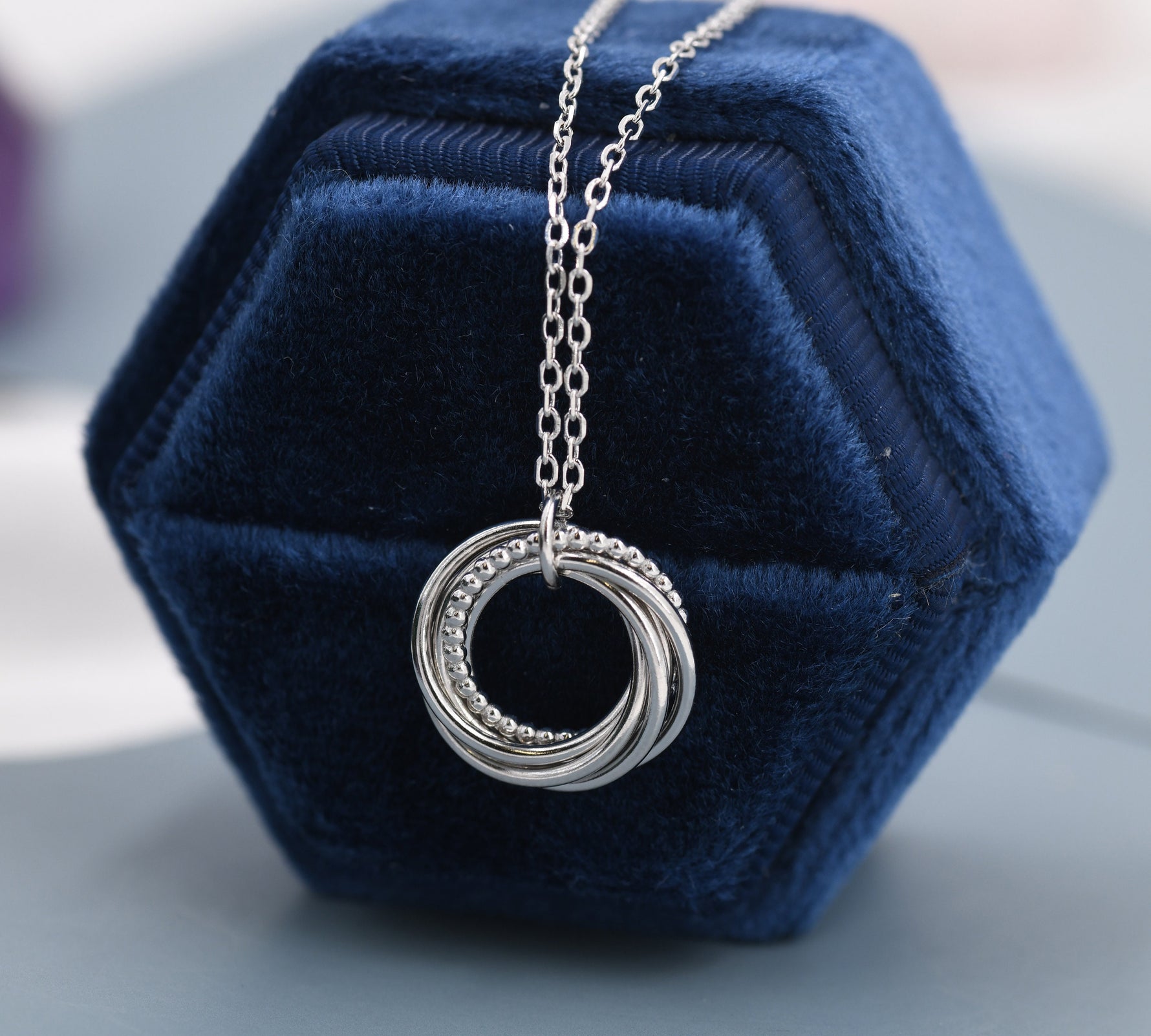 Sterling Silver Interlocking Circles Pendant Necklace with Dotted Details, Six Entwined Rings for 60s, 60th Infinity Necklace