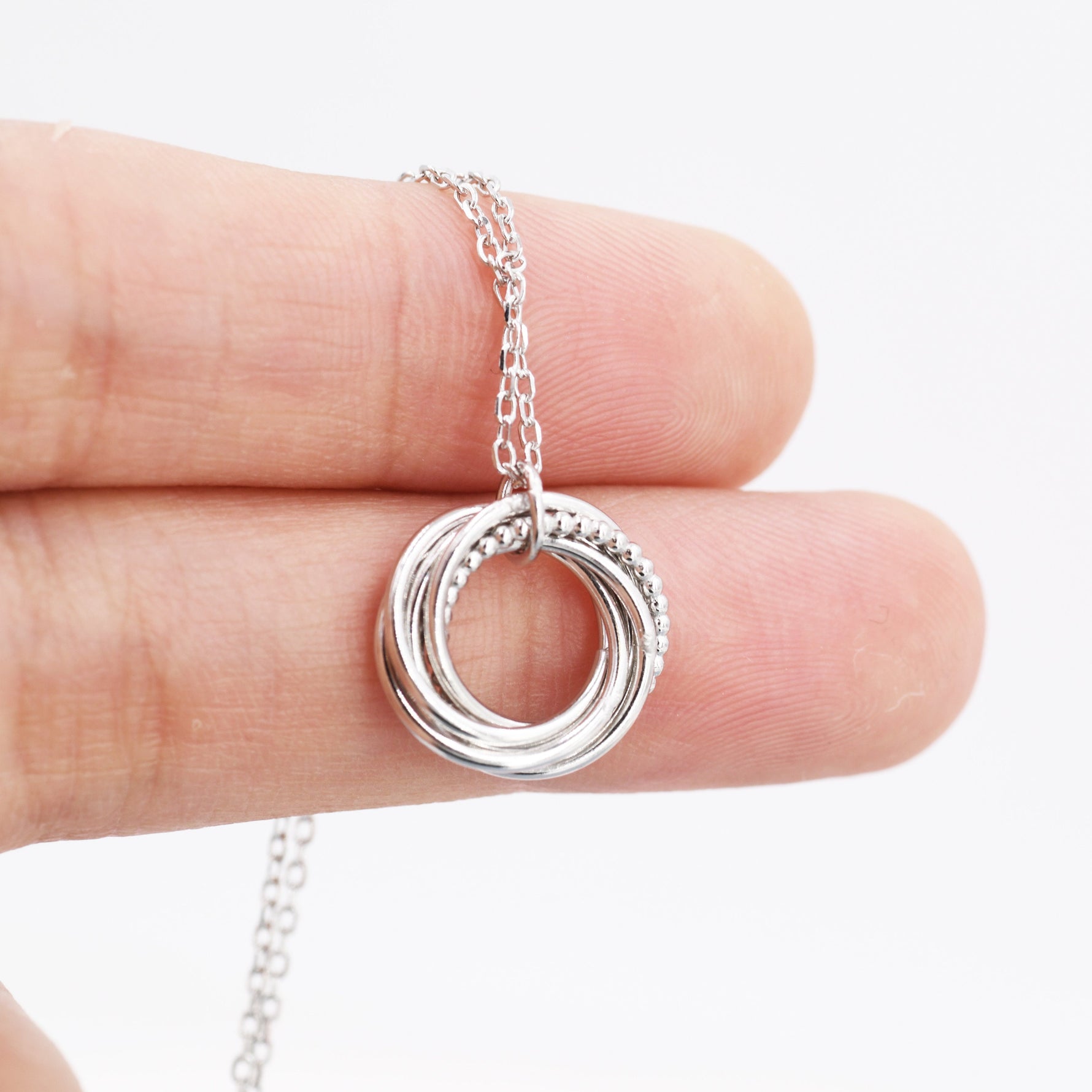 Sterling Silver Interlocking Circles Pendant Necklace with Dotted Details, Six Entwined Rings for 60s, 60th Infinity Necklace