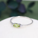 Peridot Oval Ring with CZ Accents