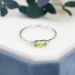 Peridot Oval Ring with CZ Accents