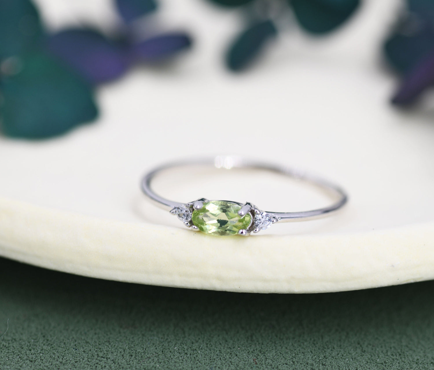 Peridot Oval Ring with CZ Accents