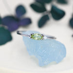 Peridot Oval Ring with CZ Accents
