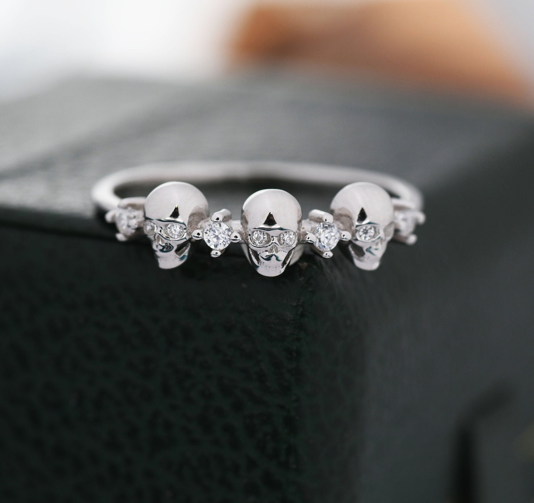 Triple Skull Motif Ring with Clear CZ