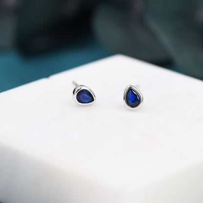 Extra Tiny Sapphire Blue Droplet CZ Stud Earrings in Sterling Silver, Tiny Pear Cut Bezel CZ Stud Earrings, September Birthstone