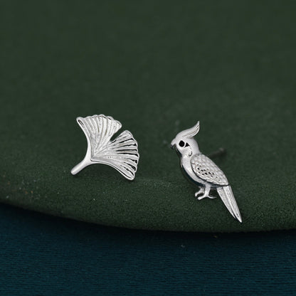 Mismatched Parrot and Ginkgo Leaf Stud Earrings in Sterling Silver, Asymmetric Bird and  Leaf Earrings