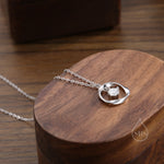 Genuine Moissanite and Mobius Circle Pendant Necklace in Sterling Silver, Delicate Moissanite Halo