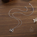 Genuine Moissanite and Mobius Circle Pendant Necklace in Sterling Silver, Delicate Moissanite Halo