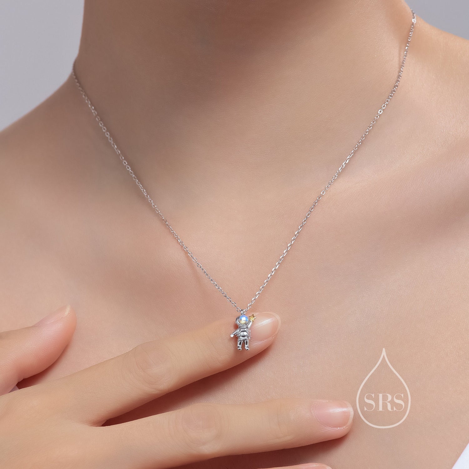 Astronaut Pendant Necklace in Sterling Silver with Lab Moonstone, Spaceman Holding Star Necklace, Space Planet Celestial Jewellery