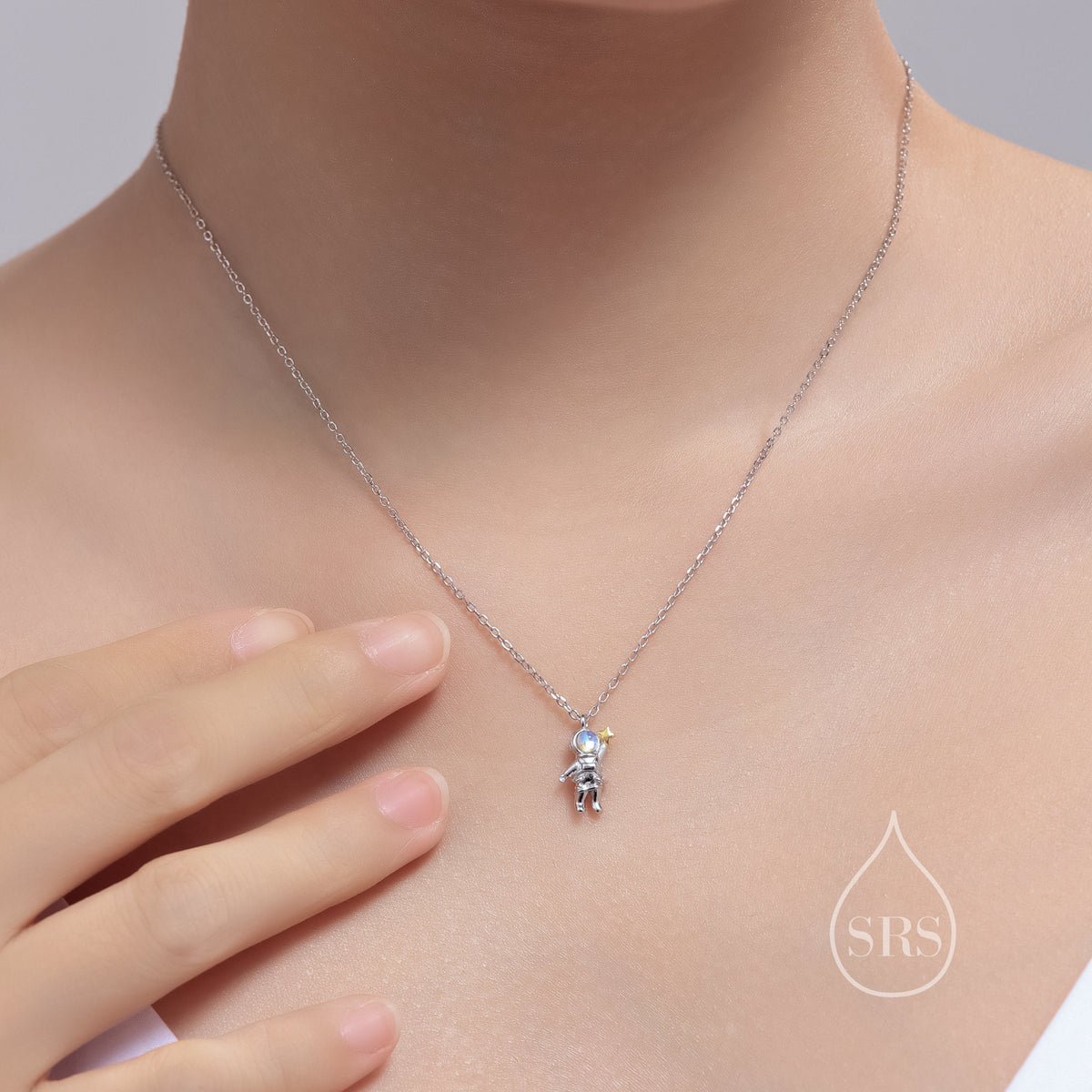 Astronaut Pendant Necklace in Sterling Silver with Lab Moonstone, Spaceman Holding Star Necklace, Space Planet Celestial Jewellery