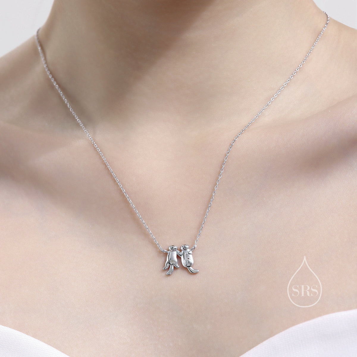 Otters Holding Hands Charm Necklace