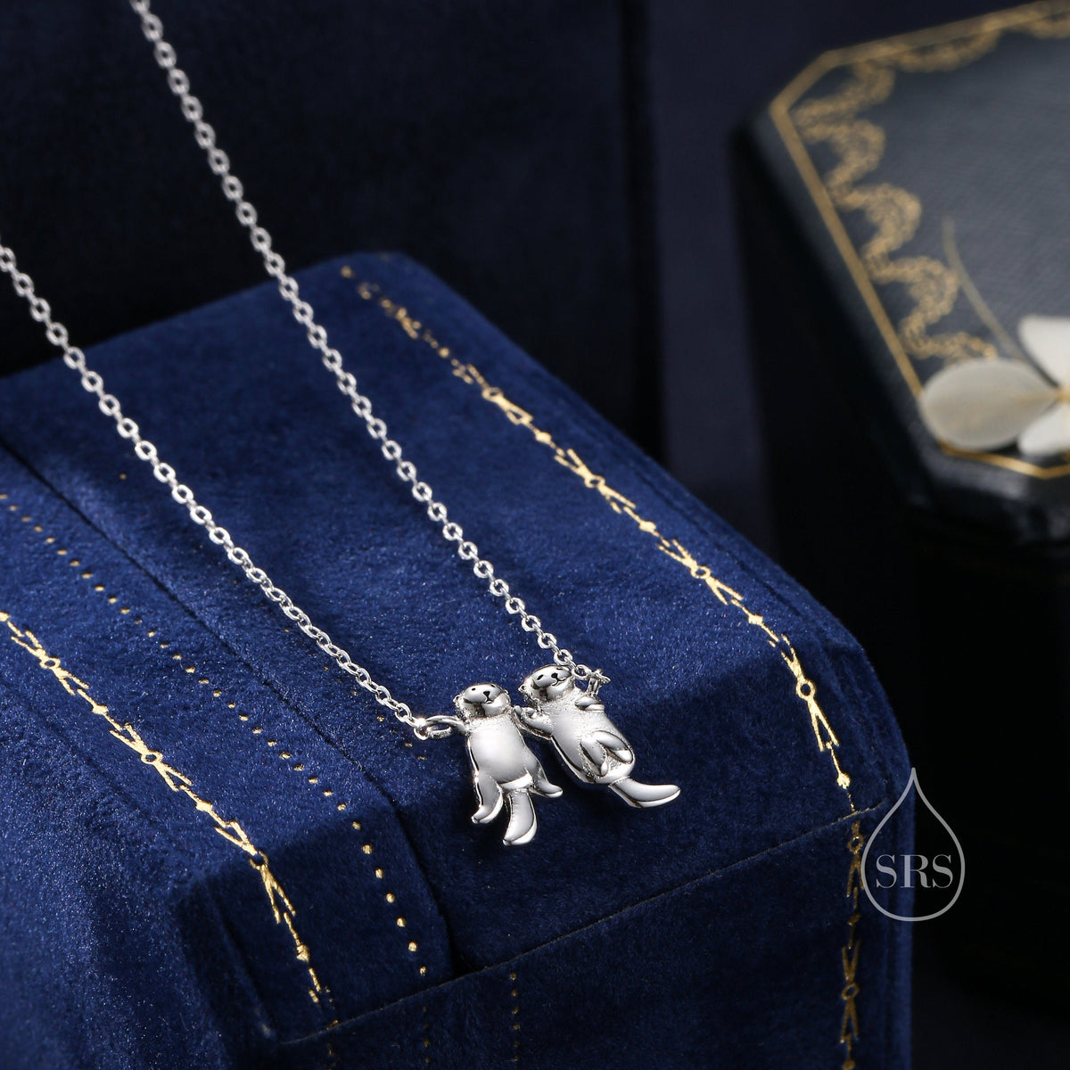 Otters Holding Hands Charm Necklace
