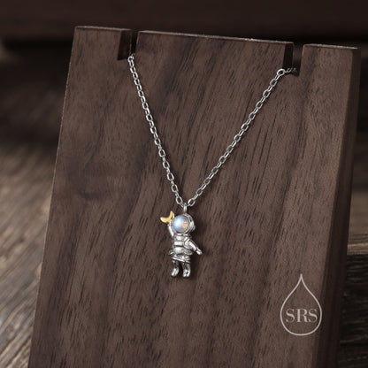 Astronaut Pendant Necklace in Sterling Silver with Lab Moonstone, Spaceman Holding Moon Necklace, Space Planet Celestial Jewellery