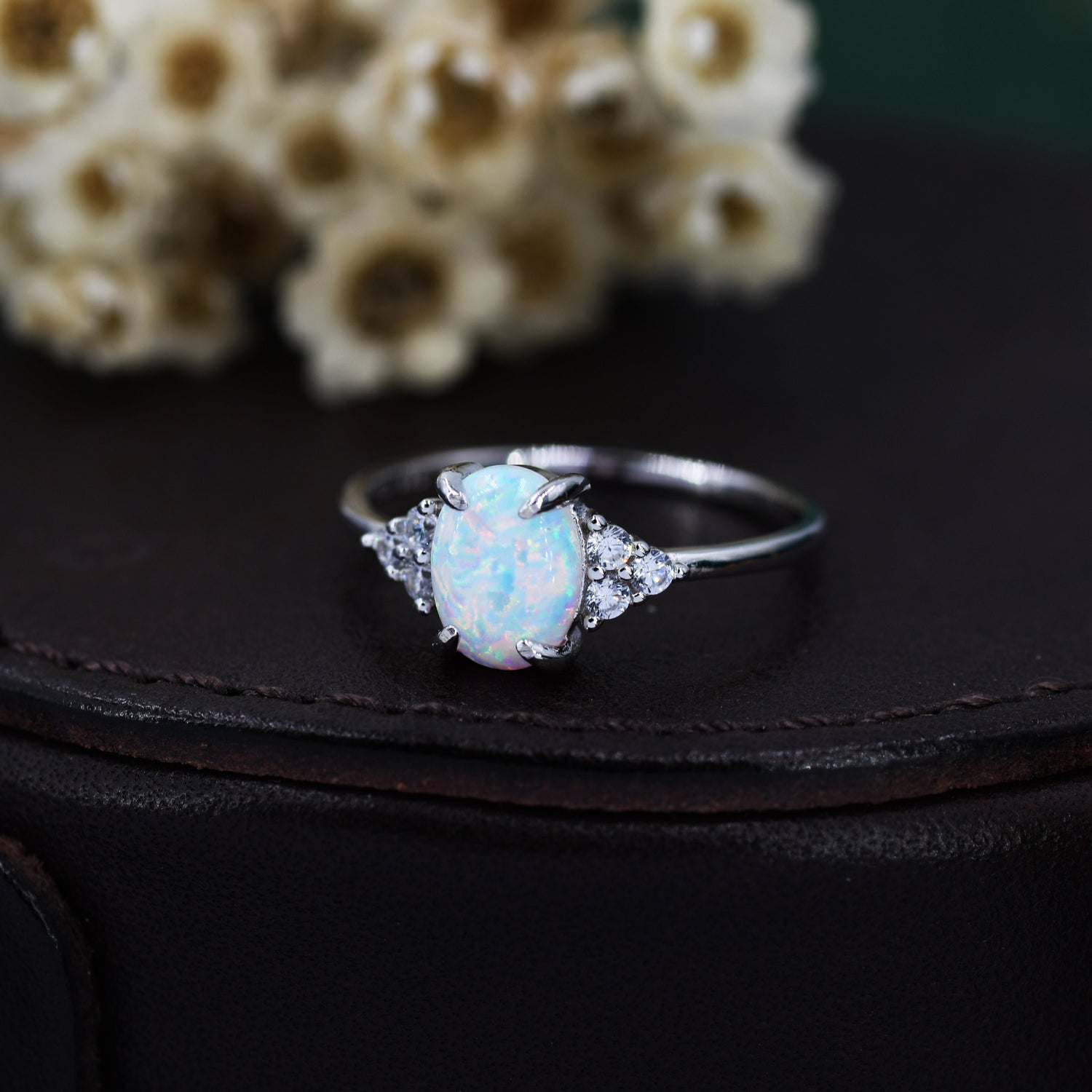 Oval Fire Opal Halo Ring with CZ Accents