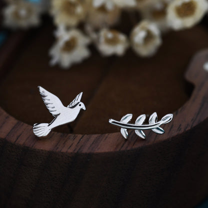 Mismatched Peace Dove and Olive Branch Stud Earrings in Sterling Silver, Asymmetric Peace Bird and Leaf Earrings