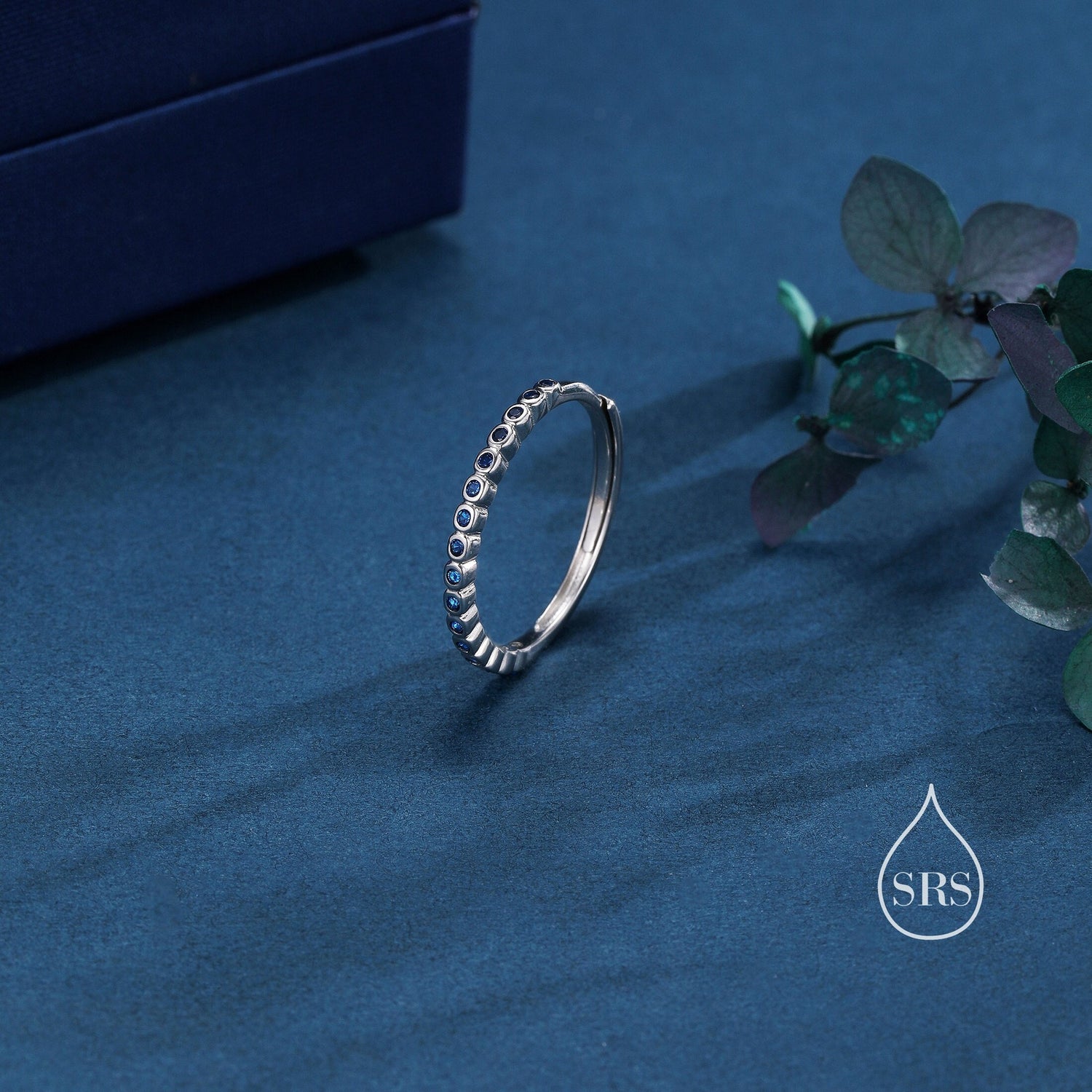 Sapphire Blue CZ Half Eternity Bezel Ring