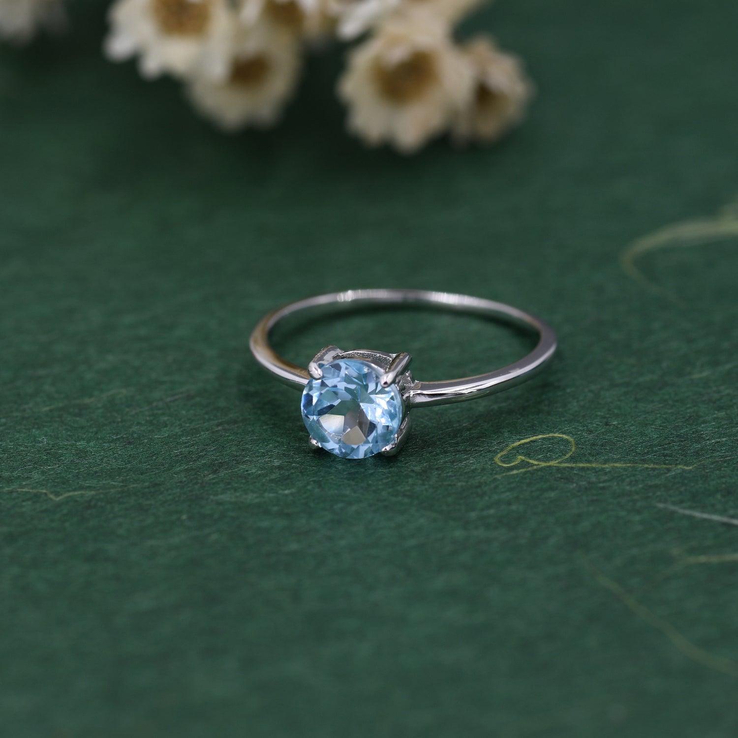 6mm Round Sky Blue Topaz Solitaire Ring