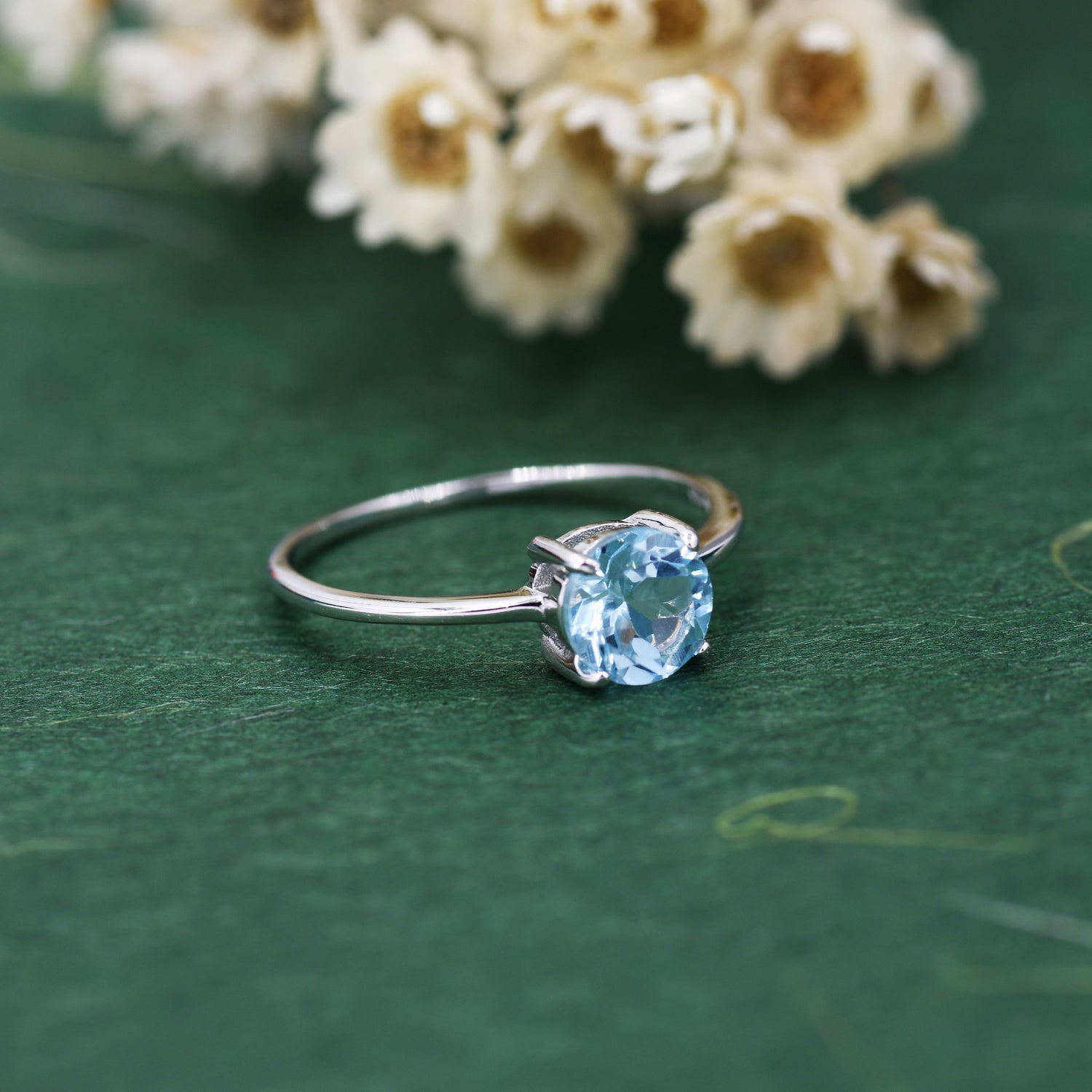 6mm Round Sky Blue Topaz Solitaire Ring