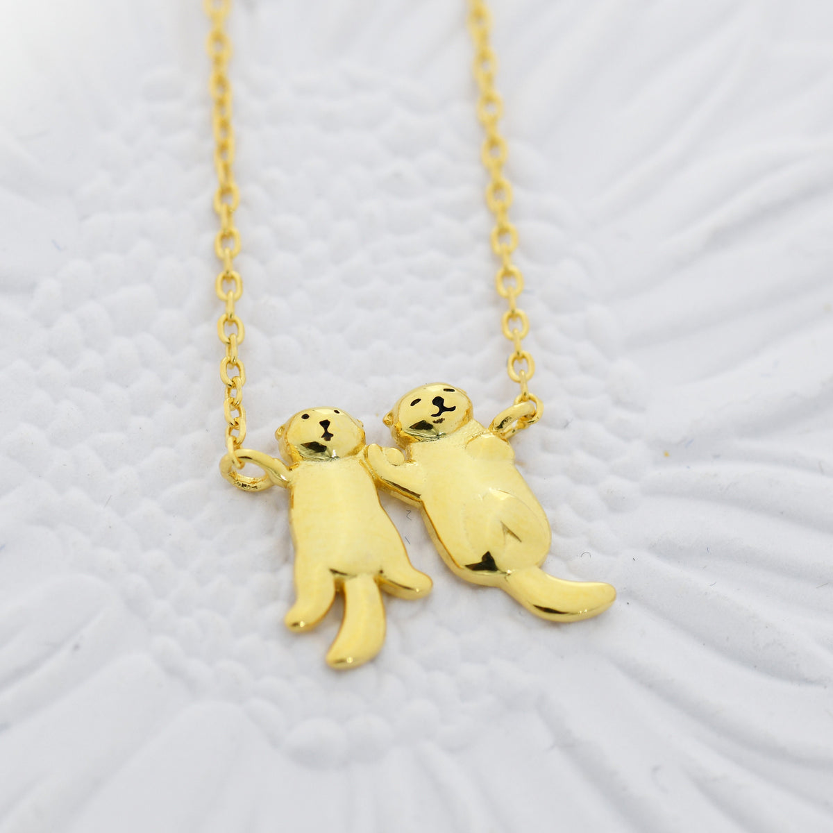 Otters Holding Hands Charm Necklace