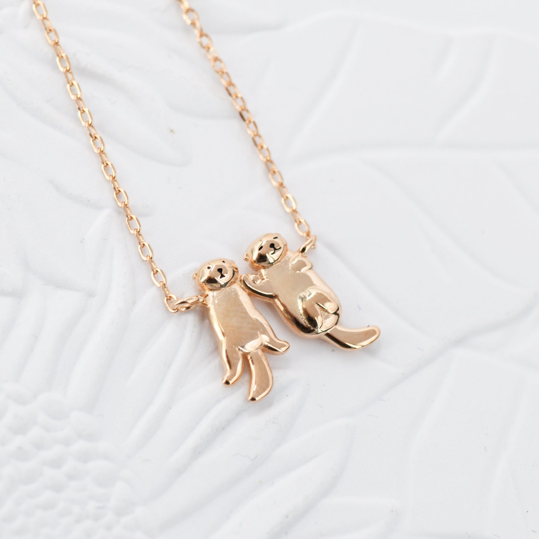 Tiny Otter Holding Hands Pendant Necklace in Sterling Silver, Silver or Gold or Rose Gold, Nature Inspired Animal Necklace