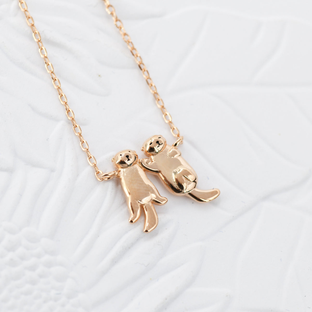 Otters Holding Hands Charm Necklace