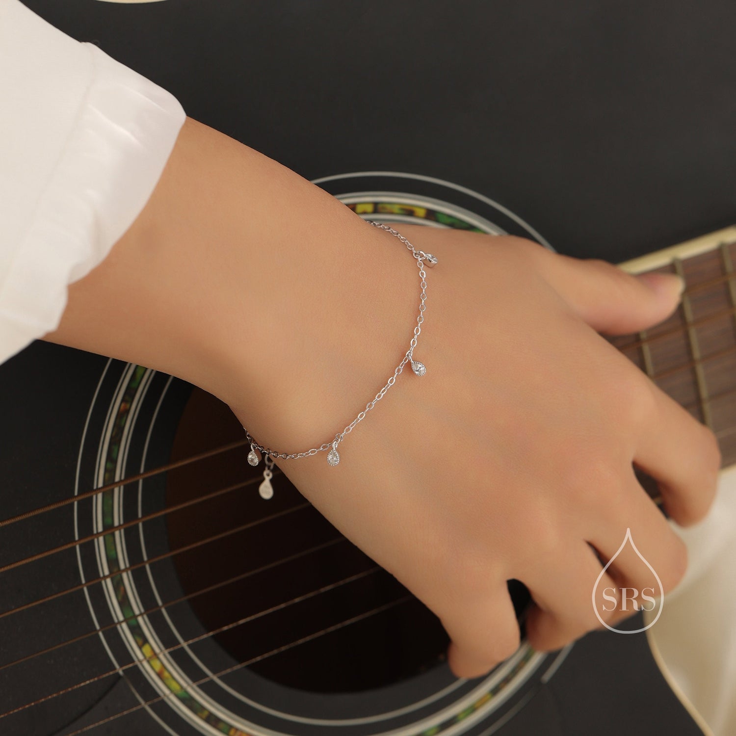 Clear CZ Pear Cut Bezel Station Bracelet