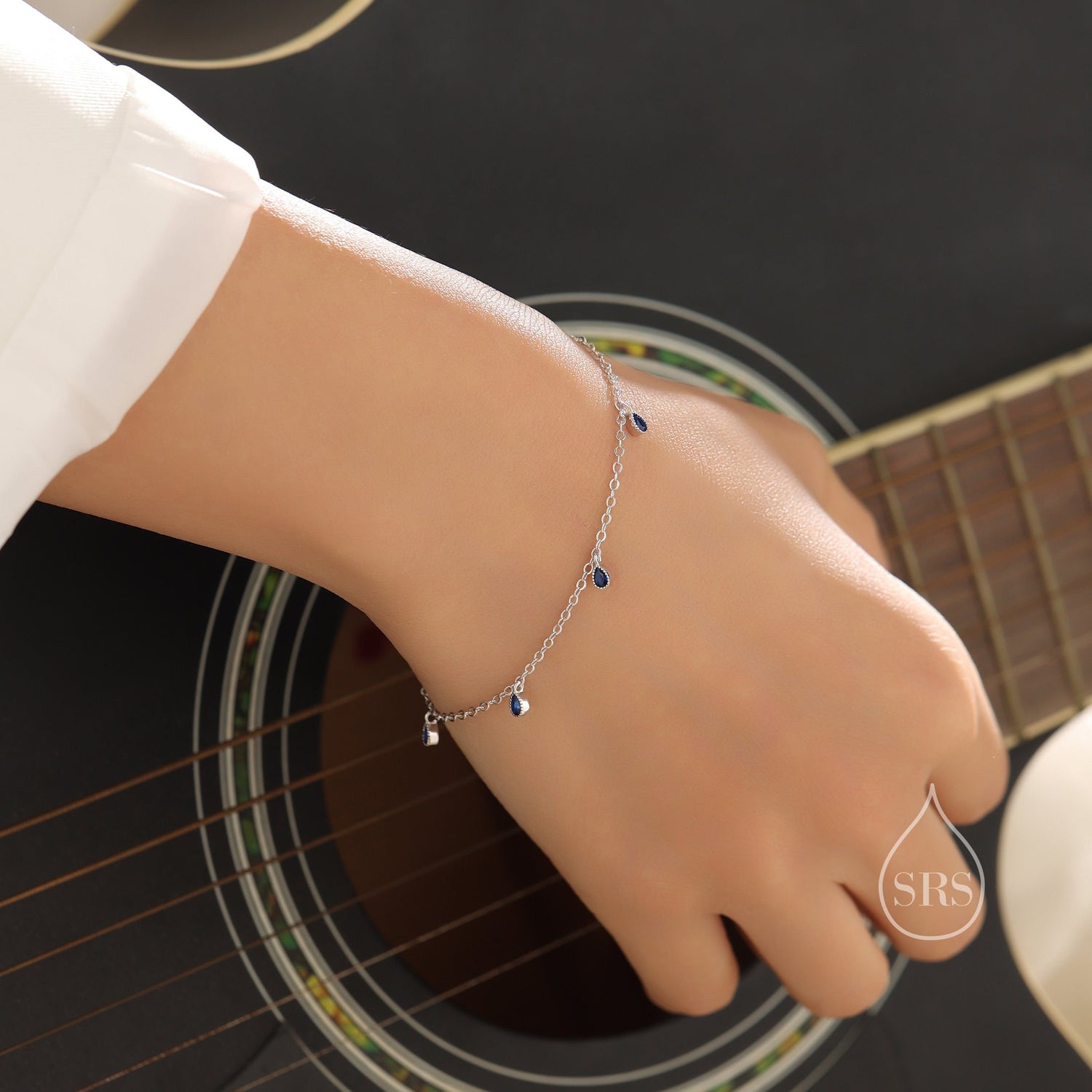 Blue CZ Pear Cut Bezel Station Bracelet