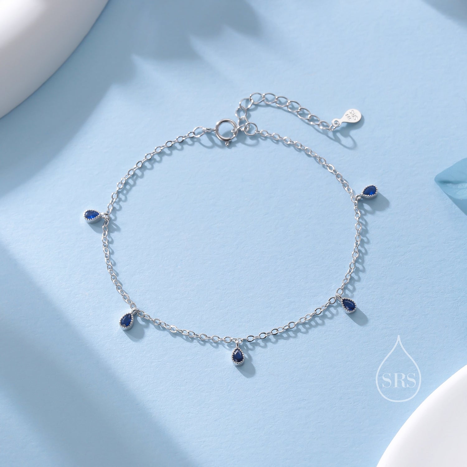 Blue CZ Pear Cut Bezel Station Bracelet