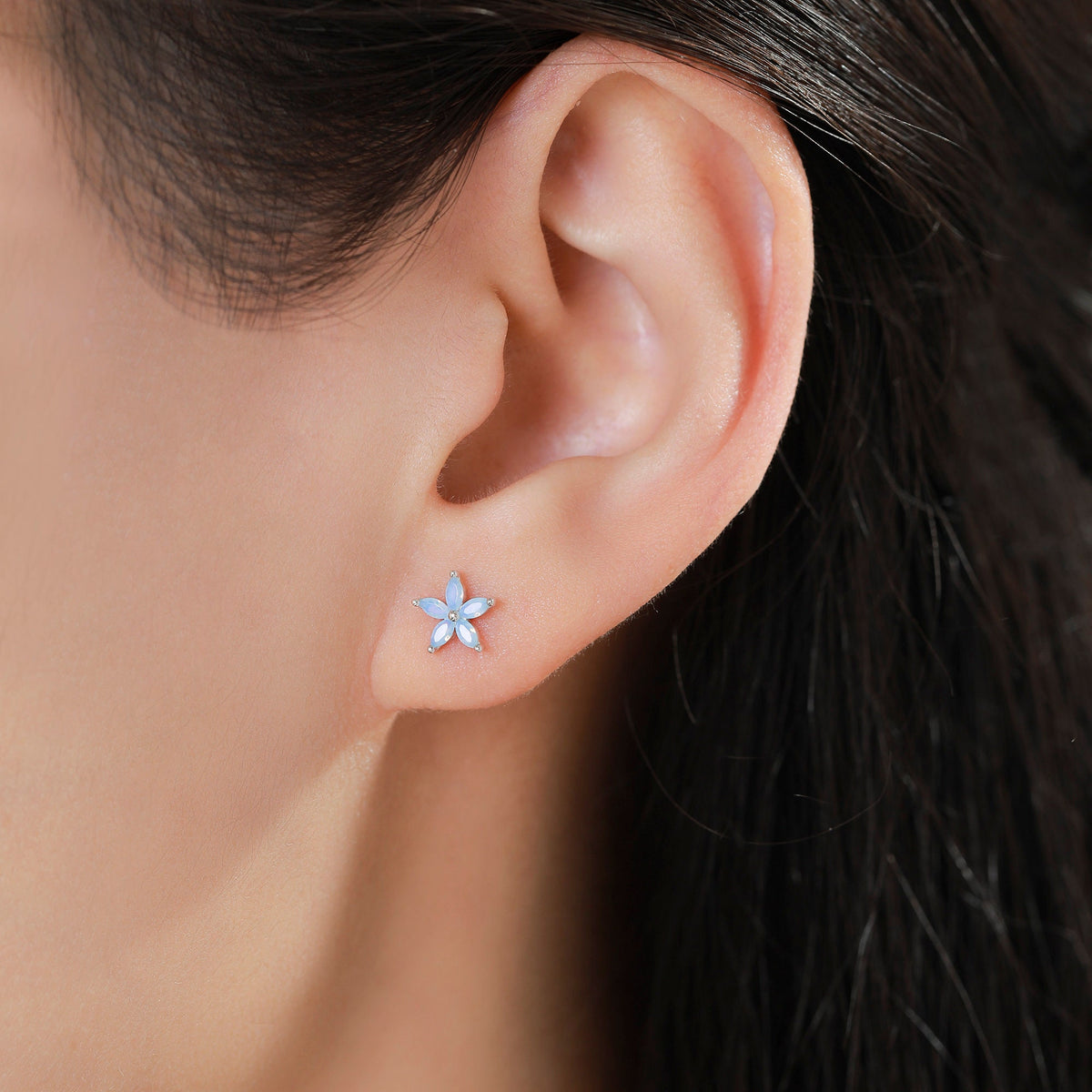 Opal Blue CZ Flower 18G Screw Back Earrings in Sterling Silver
