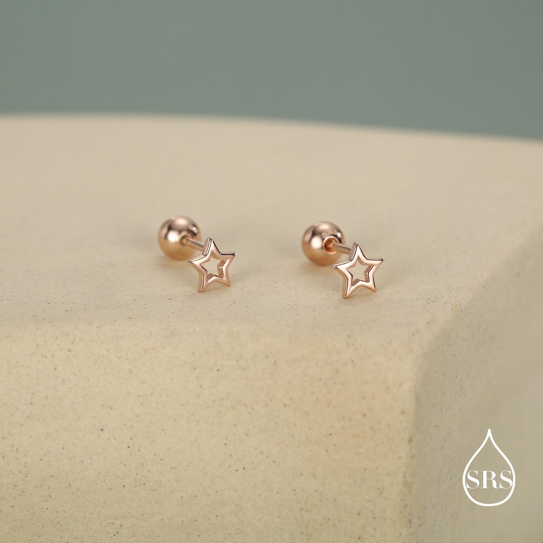 Tiny Open Star Screw Back Earrings in Sterling Silver