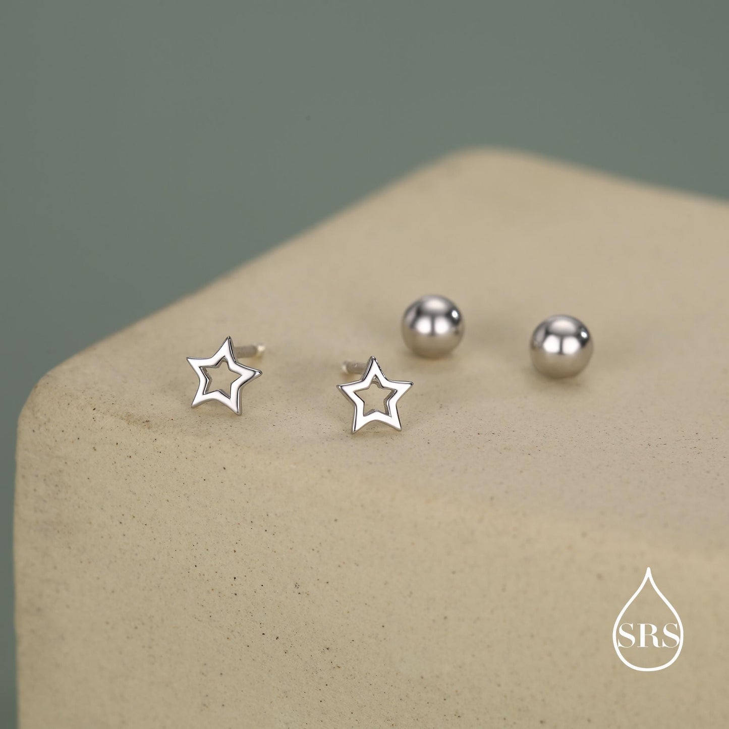 Tiny Open Star Screw Back Earrings in Sterling Silver