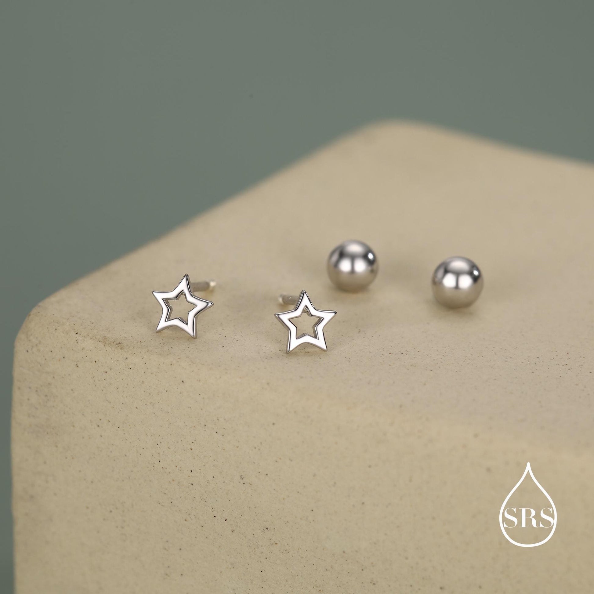 Tiny Open Star Screw Back Earrings in Sterling Silver