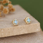 Blue Opal CZ Oval Halo Stud Earrings in Sterling Silver