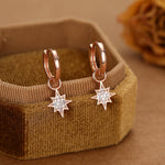 Starburst Charm Huggie Hoop Earrings in Sterling Silver with Detachable Star Burst Charms, North Star Celestial Geometric Design