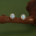 Blue Opal CZ Oval Halo Stud Earrings in Sterling Silver