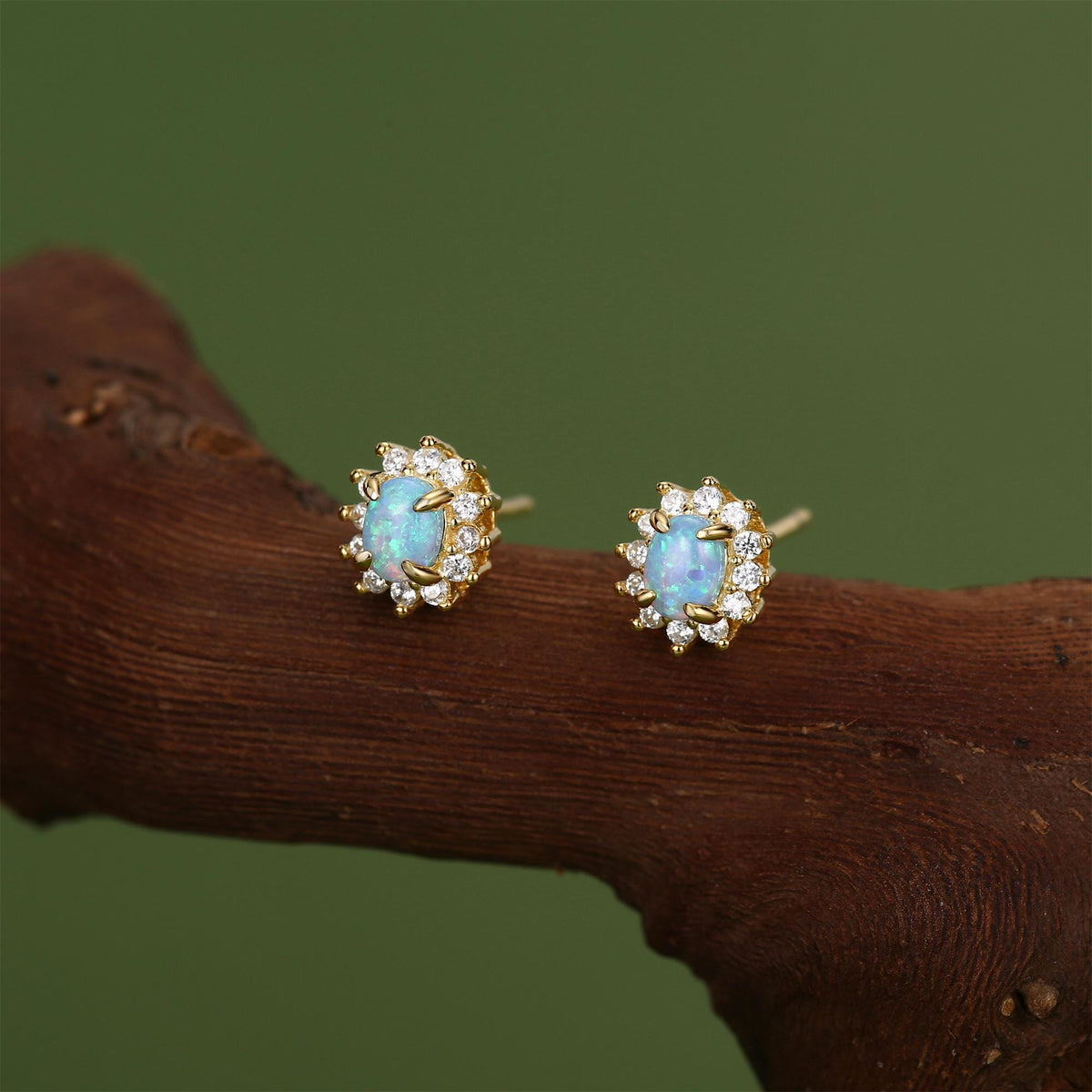 Blue Opal CZ Oval Halo Stud Earrings in Sterling Silver