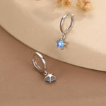 Blue CZ Star Huggie Hoop Earrings in Sterling Silver, Aquamarine Blue Star Hoops, North Star Dangle Earrings, Celestial Jewellery