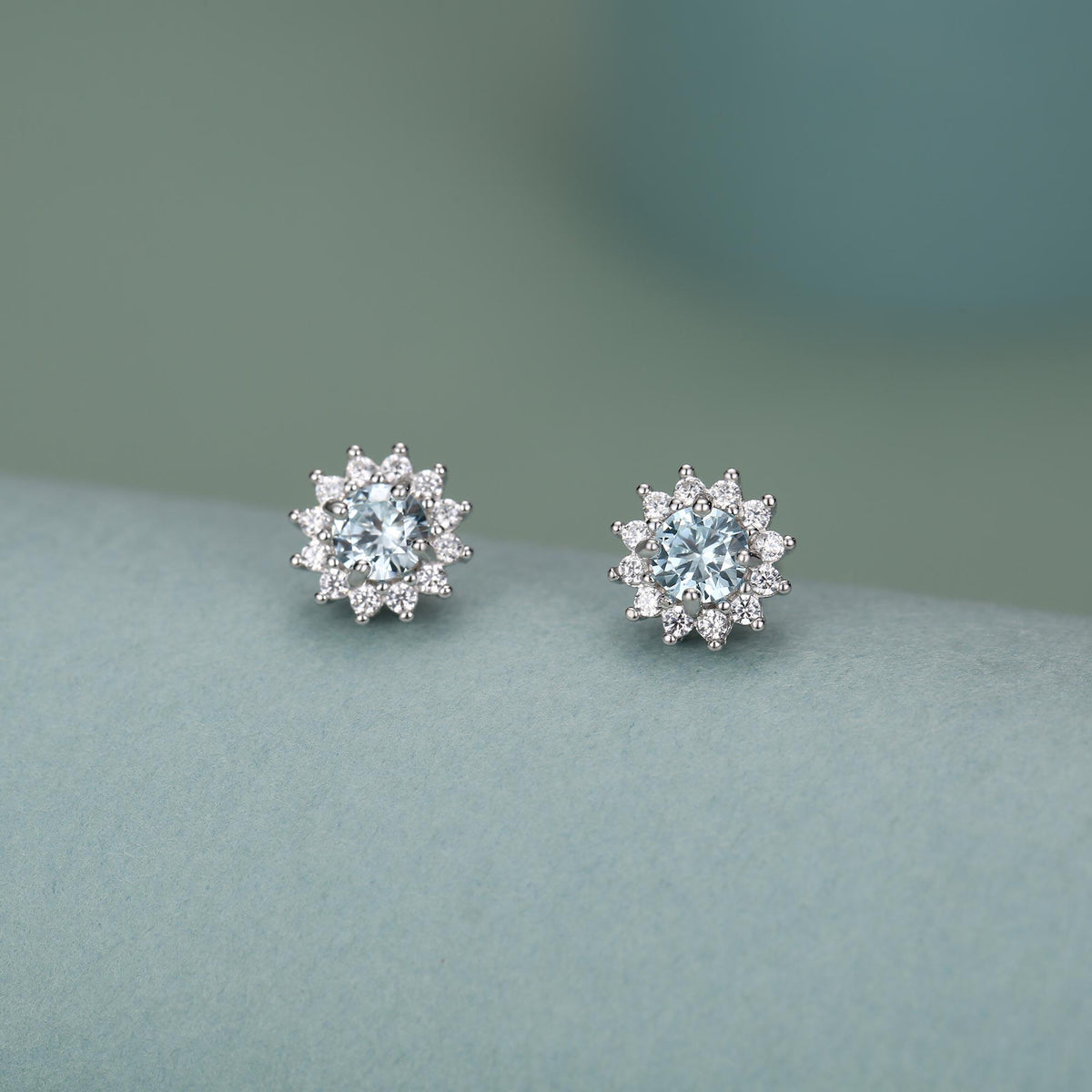 Sterling Silver Aquamarine Blue CZ Flower Stud Earrings
