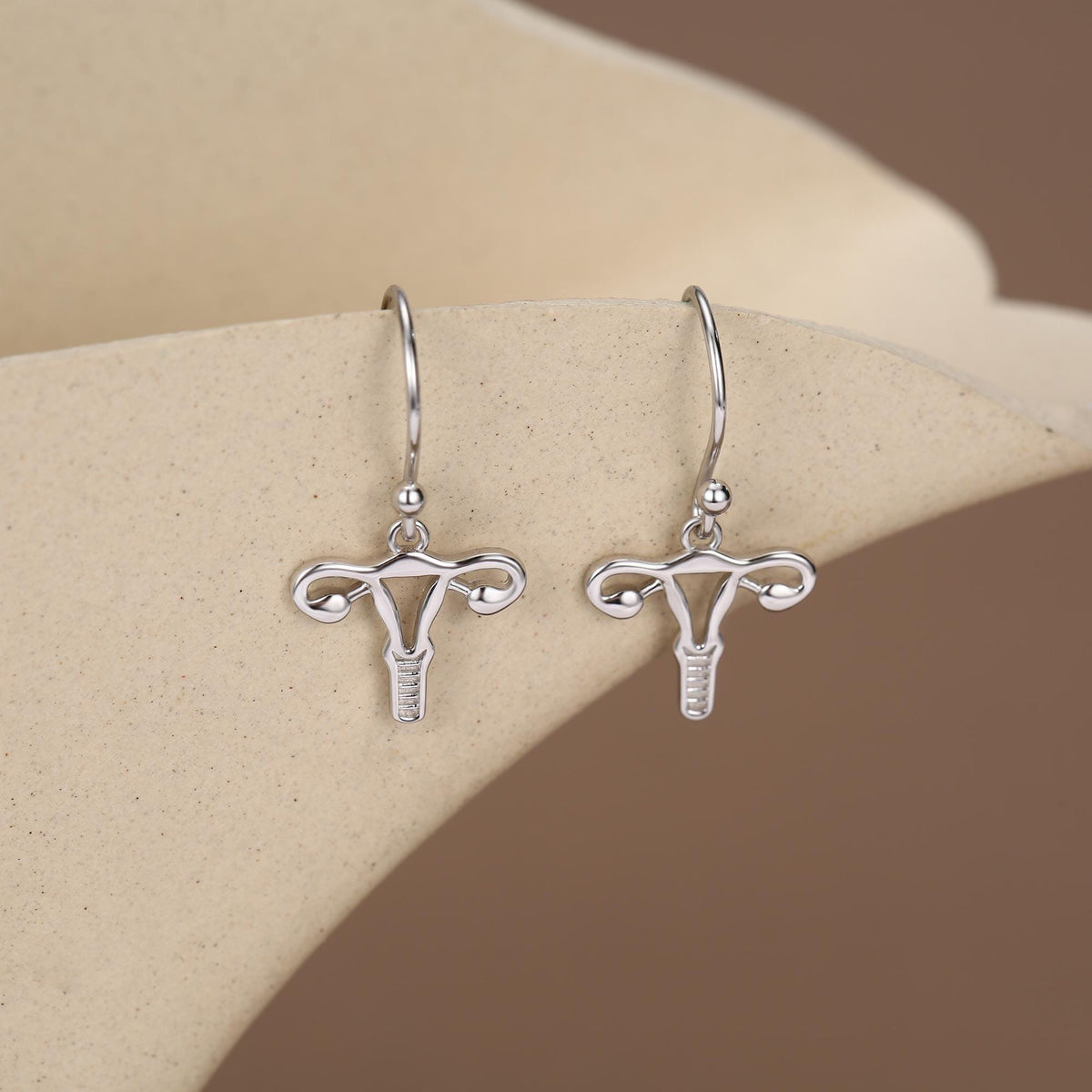 Sterling Silver Female Anatony Hoop Earrings