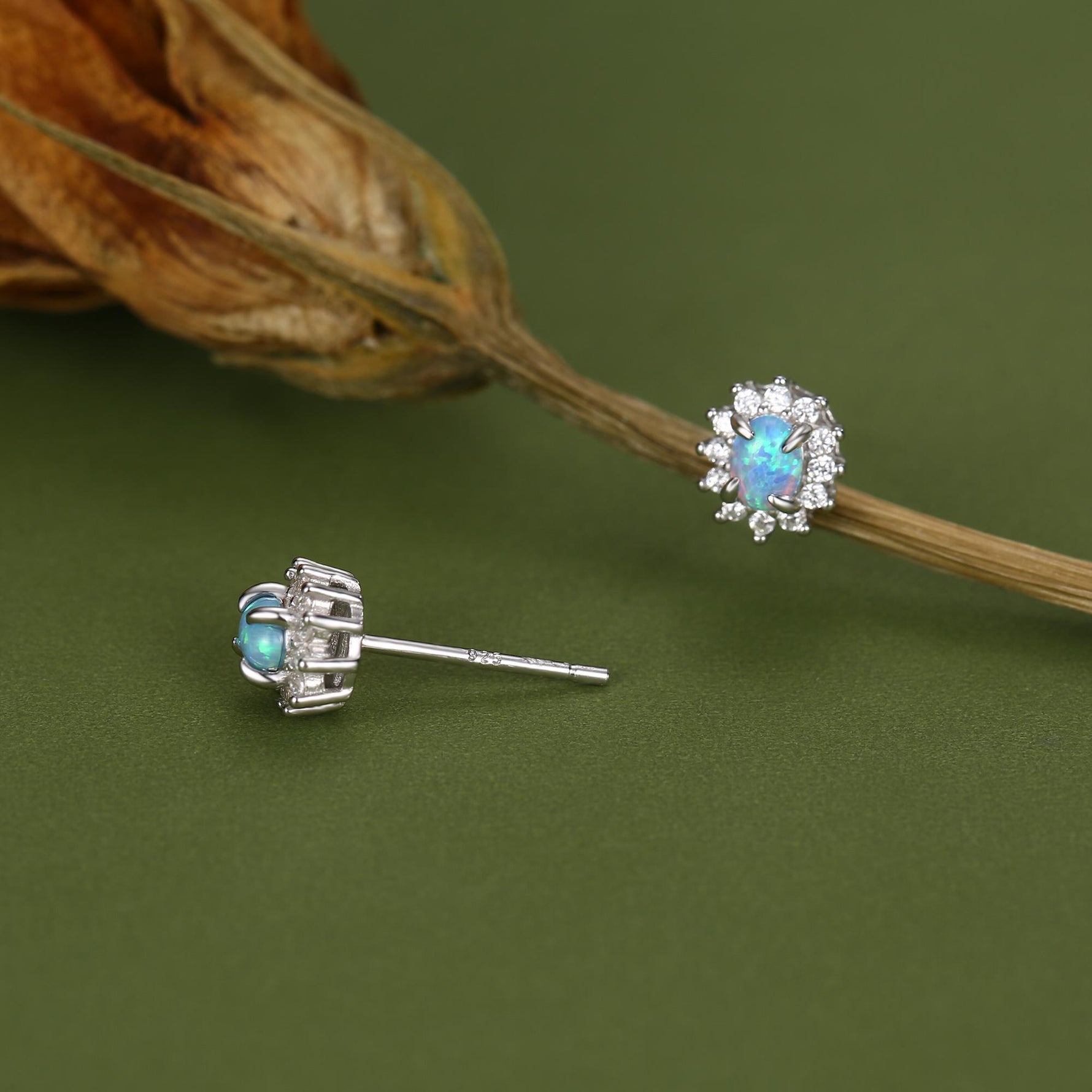 Blue Opal CZ Oval Halo Stud Earrings in Sterling Silver