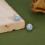 Blue Opal CZ Oval Halo Stud Earrings in Sterling Silver