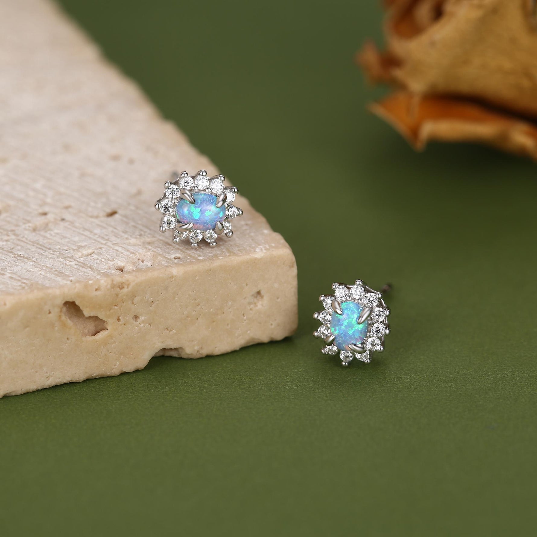 Blue Opal CZ Oval Halo Stud Earrings in Sterling Silver