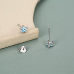 Sterling Silver 4mm Topaz Blue CZ Star Stud Earrings