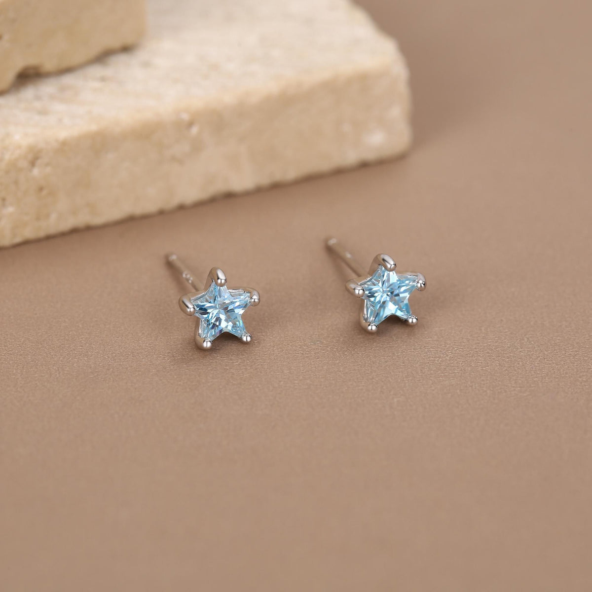 Sterling Silver 5mm Topaz Blue CZ Star Stud Earrings