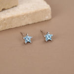 Sterling Silver 5mm Topaz Blue CZ Star Stud Earrings
