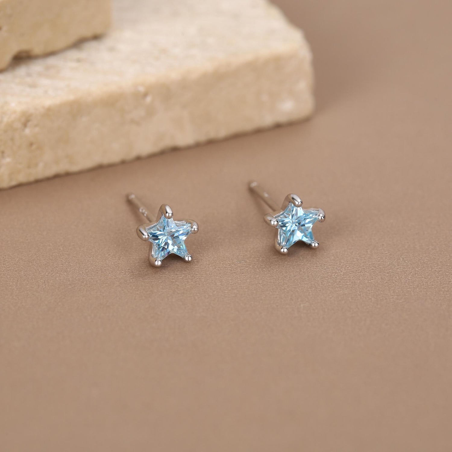 Sterling Silver 5mm Topaz Blue CZ Star Stud Earrings