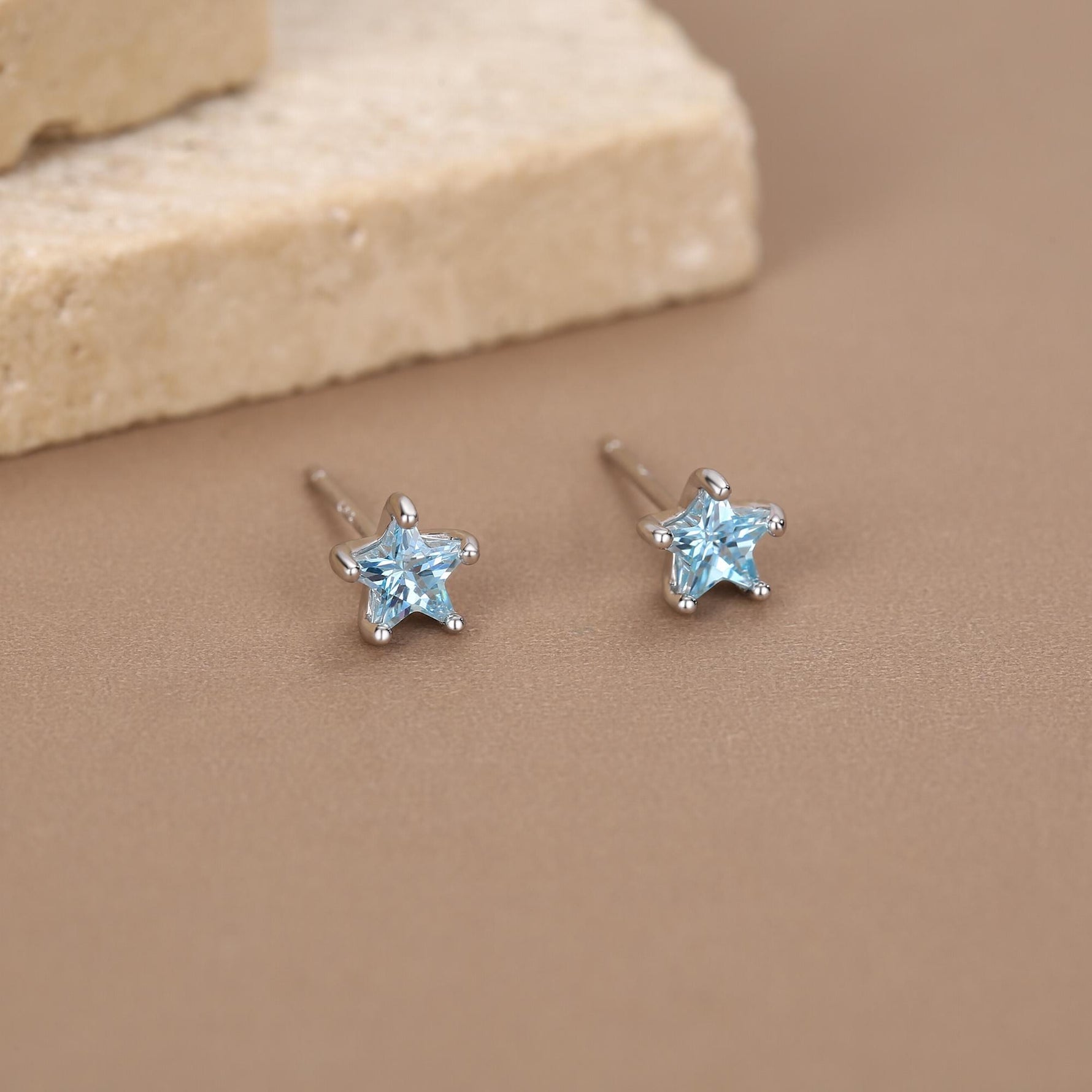 Sterling Silver 5mm Topaz Blue CZ Star Stud Earrings